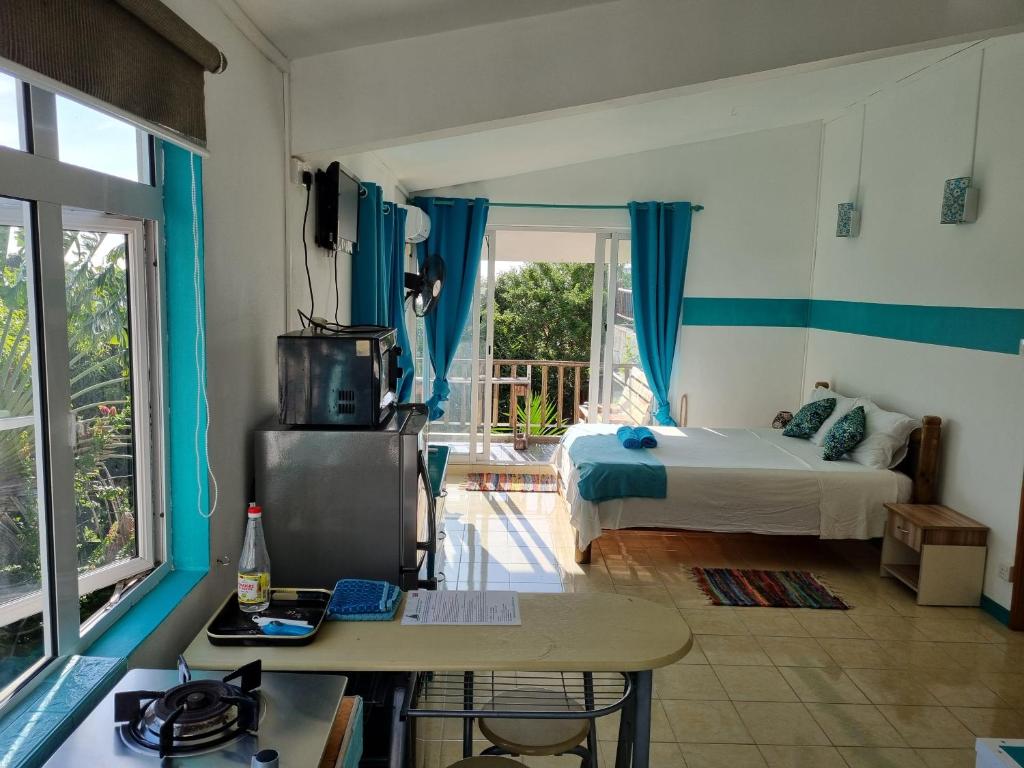 TV a/nebo společenská místnost v ubytování Surf House