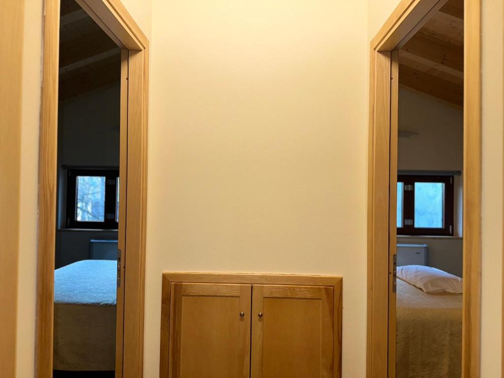 Postel nebo postele na pokoji v ubytování LorichiAmo B&b