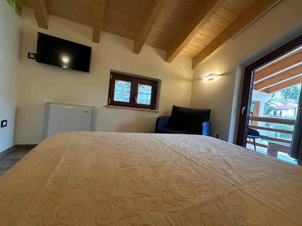 Postel nebo postele na pokoji v ubytování LorichiAmo B&b