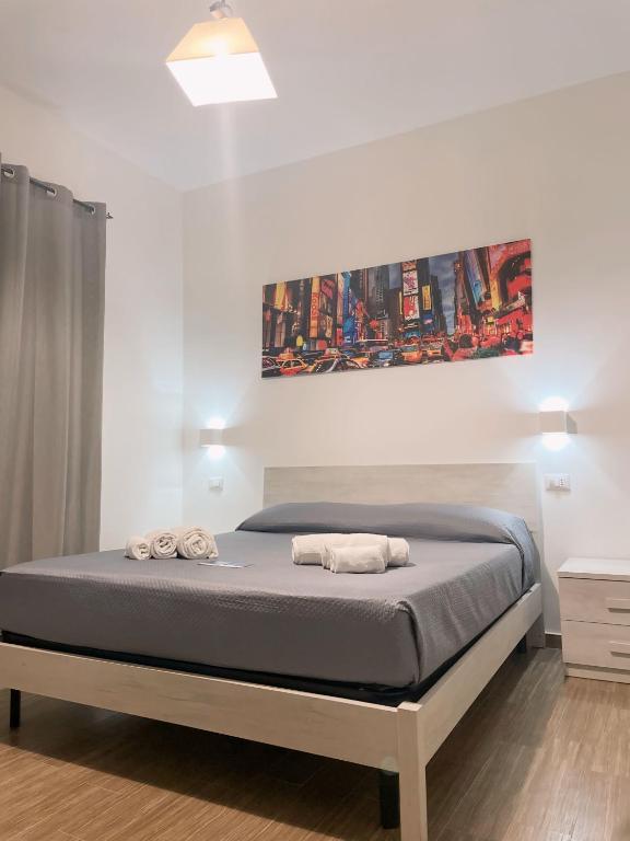 Postel nebo postele na pokoji v ubytování R Home