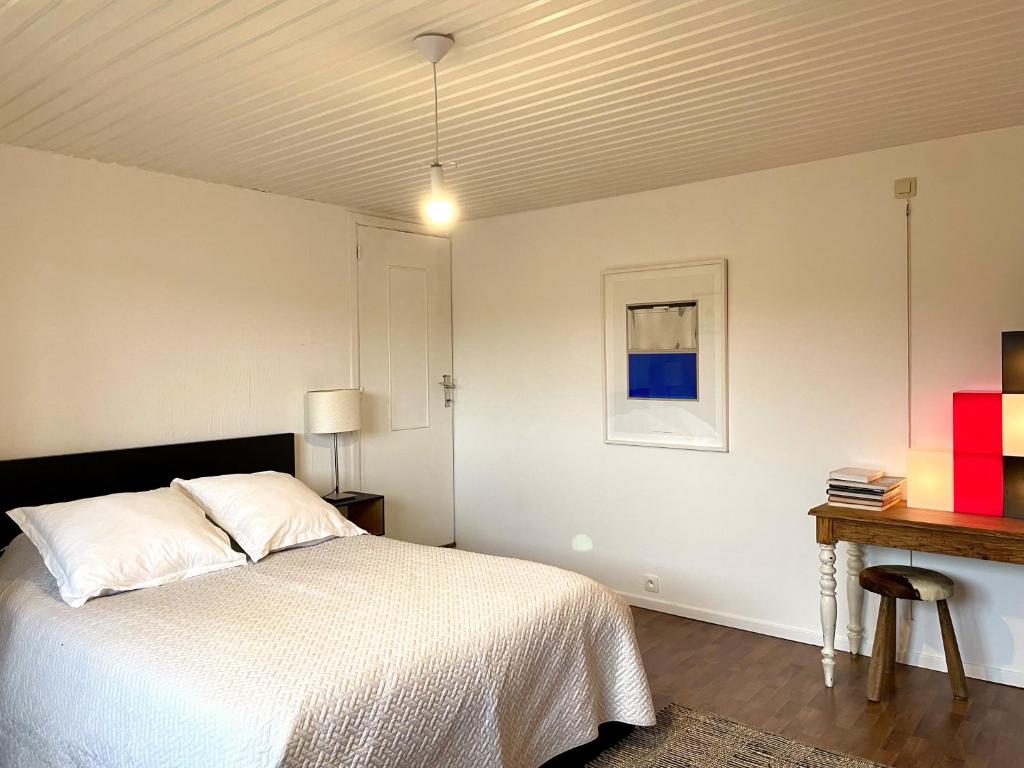 Letto o letti in una camera di Maison ardennaise à Corbion-sur-Semois