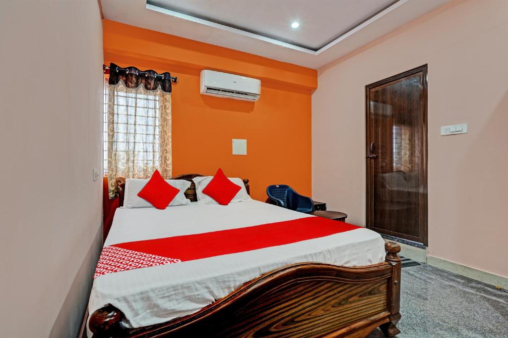 Cama o camas de una habitación en OYO Flagship Mr Lodge