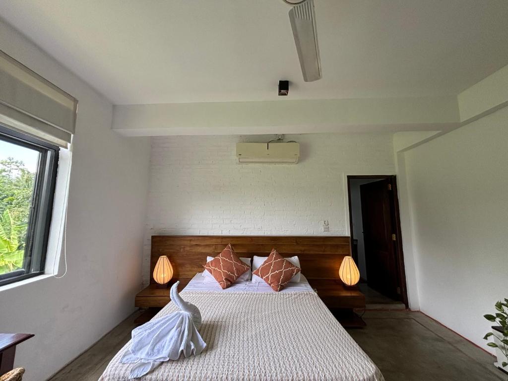 Postel nebo postele na pokoji v ubytování Rai Villa Colombo