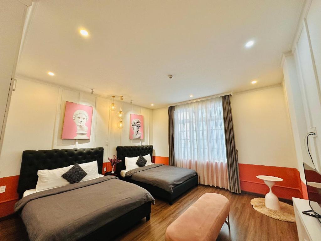 Giường trong phòng chung tại RL Boutique Dalat