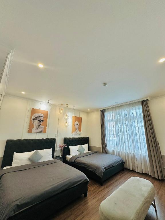 Giường trong phòng chung tại RL Boutique Dalat