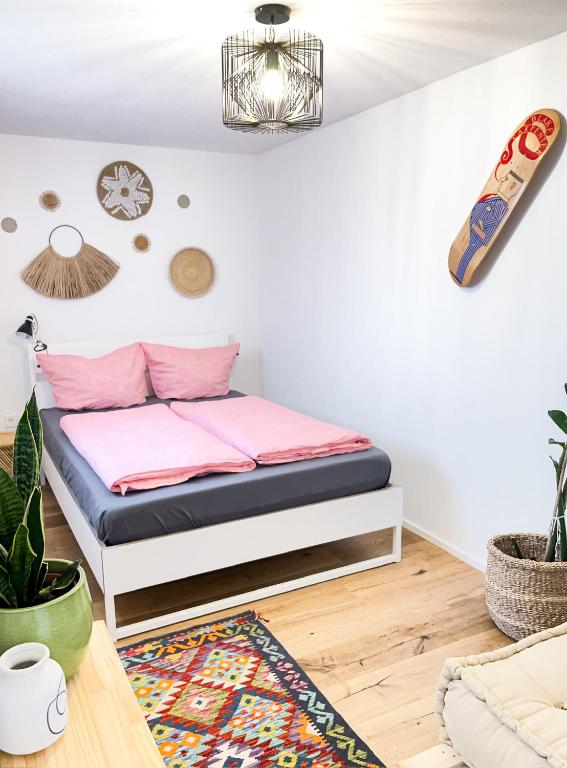 Postel nebo postele na pokoji v ubytování Hacienda Rooms