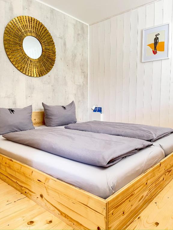Postel nebo postele na pokoji v ubytování Hacienda Rooms