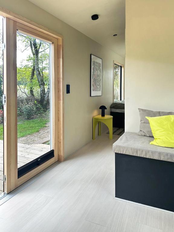 Rúm í herbergi á Tiny House mit Garten in der Lüneburger Heide