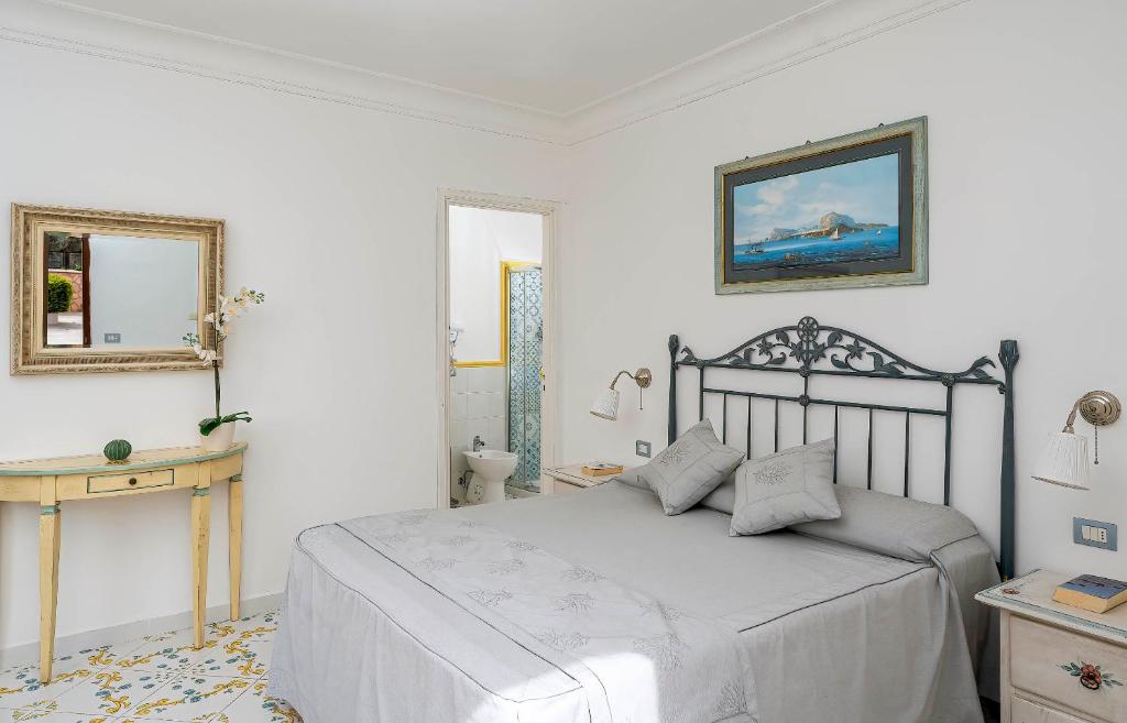 Postel nebo postele na pokoji v ubytování Hotel Il Girasole