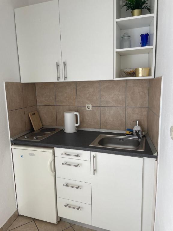 Kuchyňa alebo kuchynka v ubytovaní Apartments Vulić