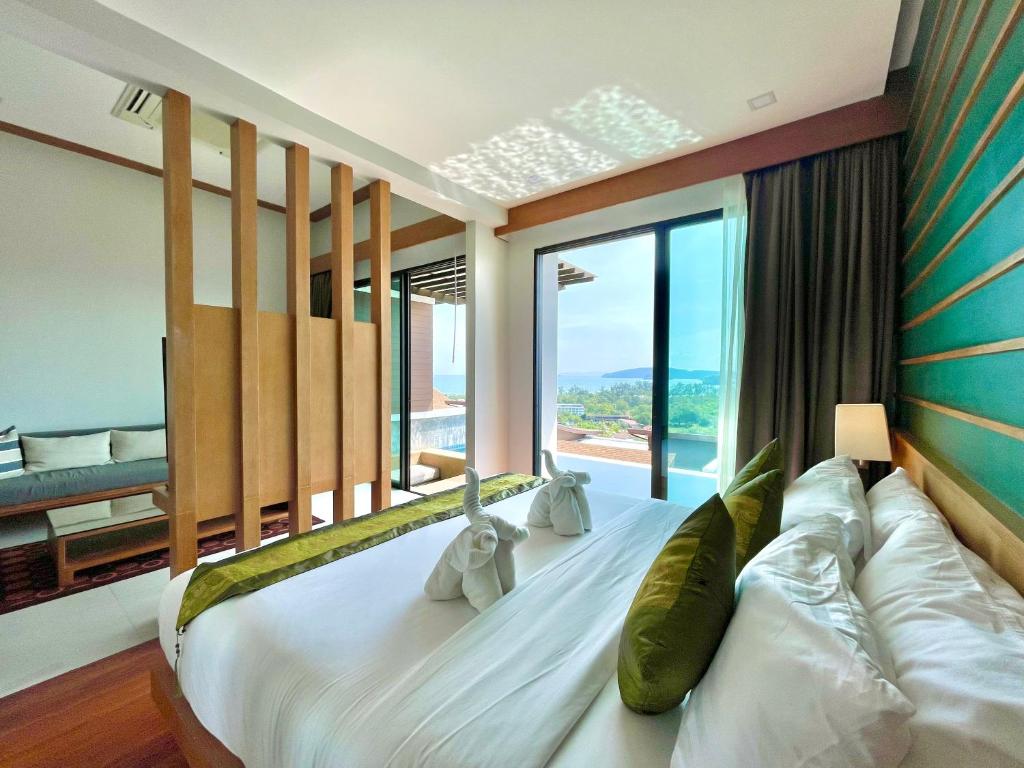 Postel nebo postele na pokoji v ubytování 207 Ao Nang, Private Sew View Pool Villa