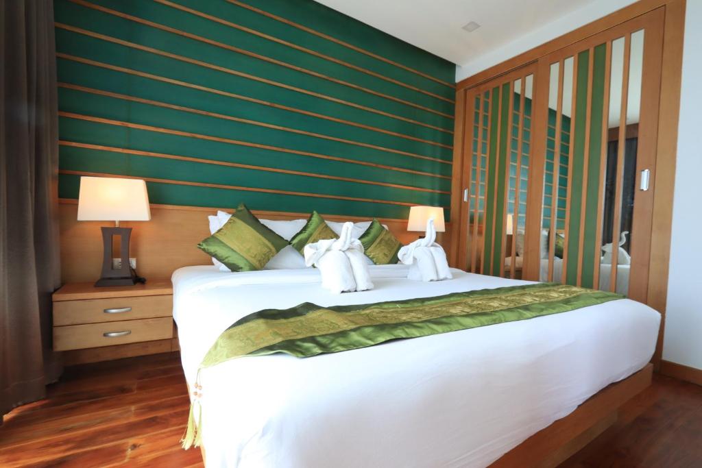 Postel nebo postele na pokoji v ubytování 207 Ao Nang, Private Sew View Pool Villa