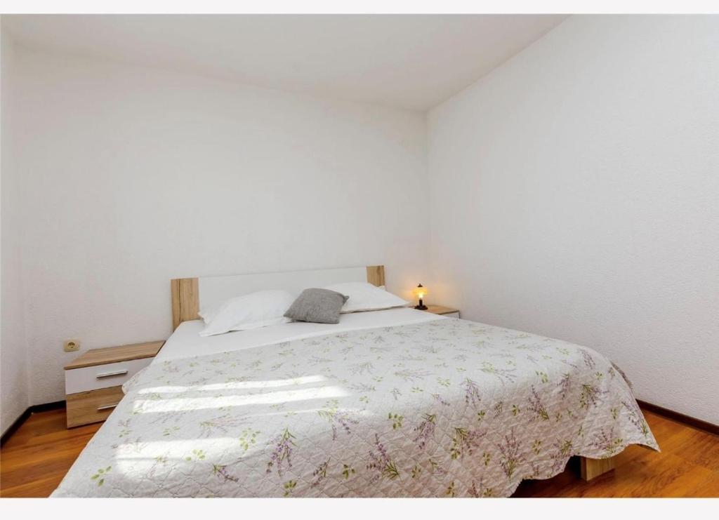 Posteľ alebo postele v izbe v ubytovaní Apartments Vulić