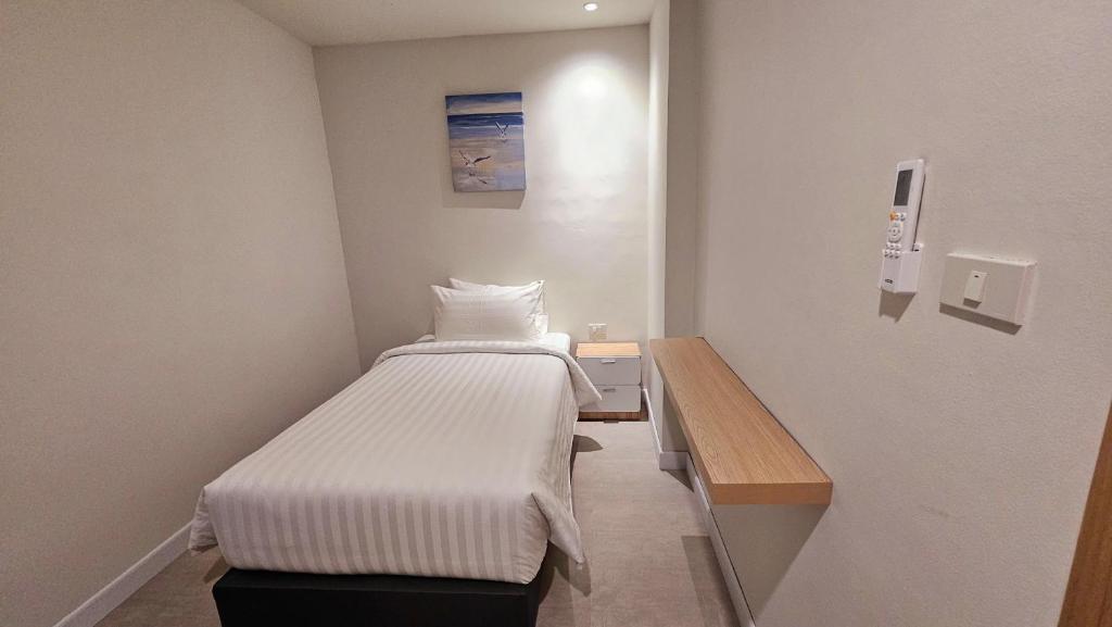 ARENICE Boutique Hotel客房内的一张或多张床位