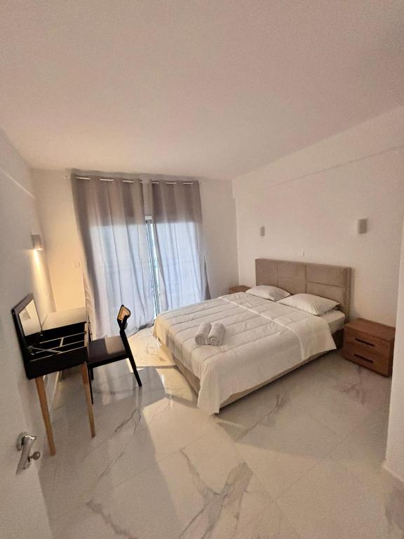 Katil atau katil-katil dalam bilik di Palatino Breez Apartments