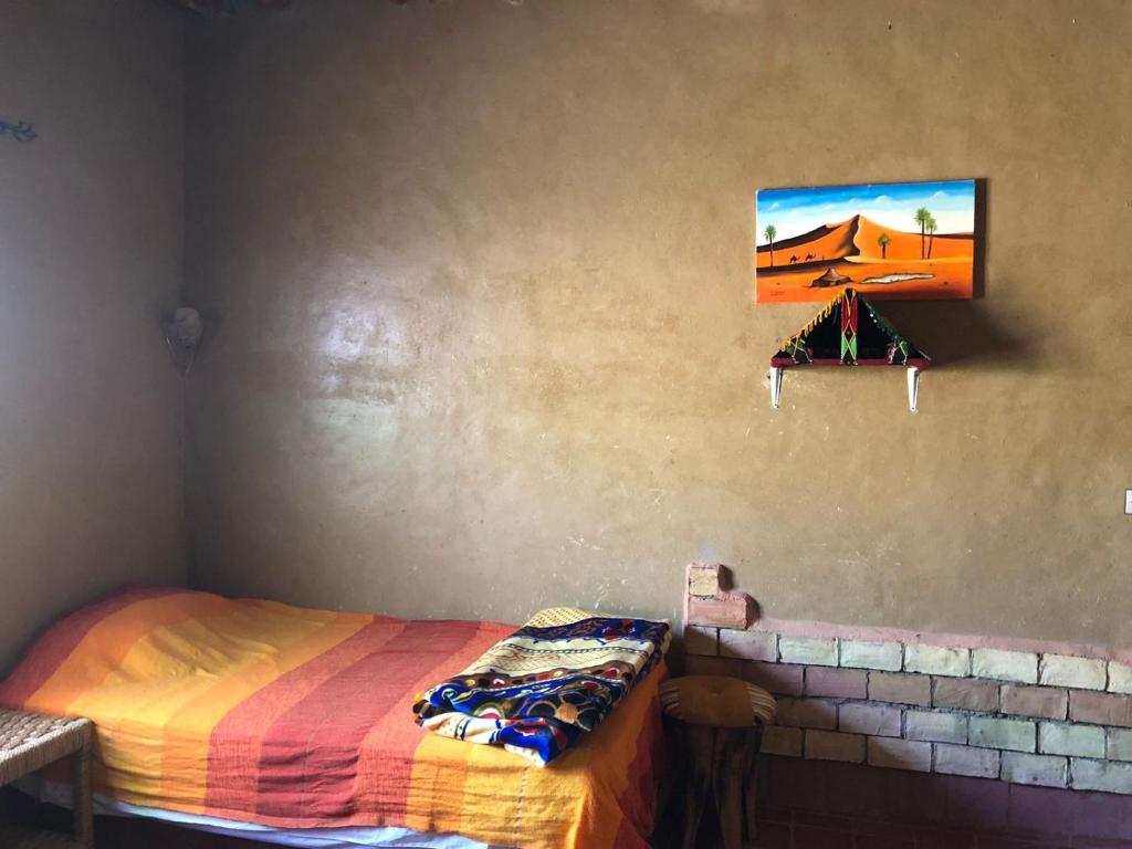 Postel nebo postele na pokoji v ubytování GITE LA GROTTE VALLEE