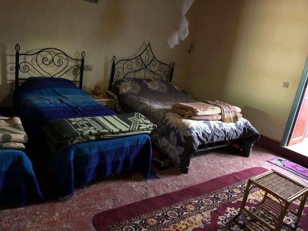 Postel nebo postele na pokoji v ubytování GITE LA GROTTE VALLEE
