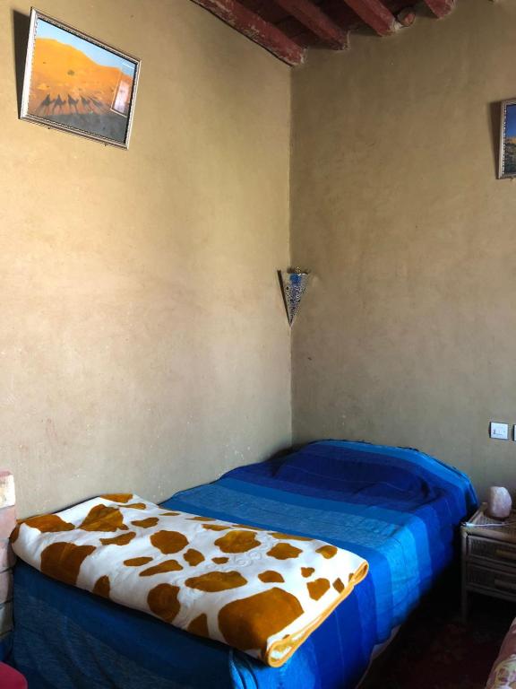 Postel nebo postele na pokoji v ubytování GITE LA GROTTE VALLEE