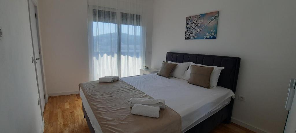 Ένα ή περισσότερα κρεβάτια σε δωμάτιο στο Al Mare