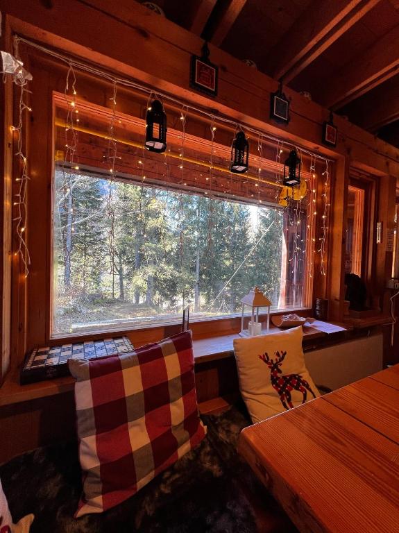 Posedenie v ubytovaní ~Chalet_Rifugio tra i boschi~