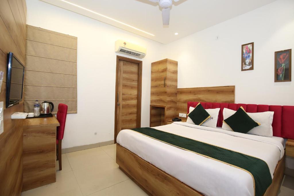 Katil atau katil-katil dalam bilik di Hotel RV Regency