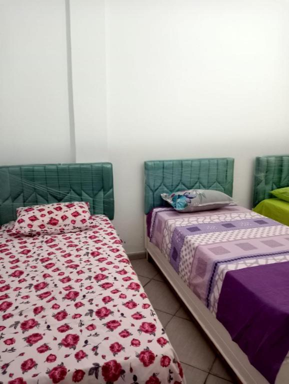 Voodi või voodid majutusasutuse Maison a louer à kelibia toas