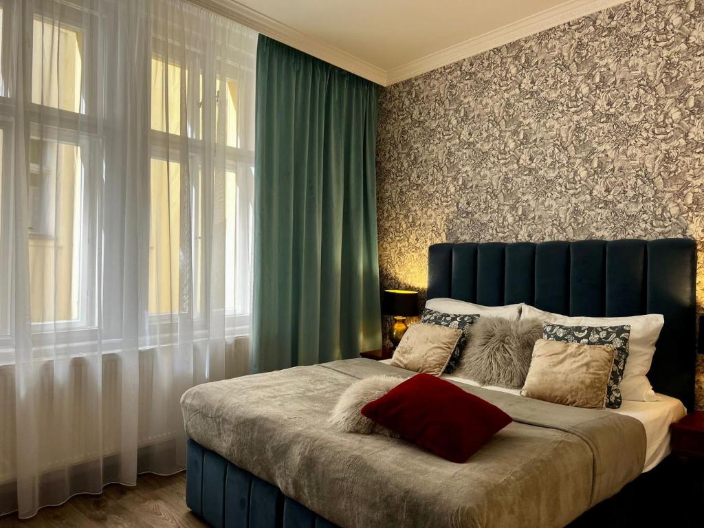 Postel nebo postele na pokoji v ubytování Antik Hotel Prague