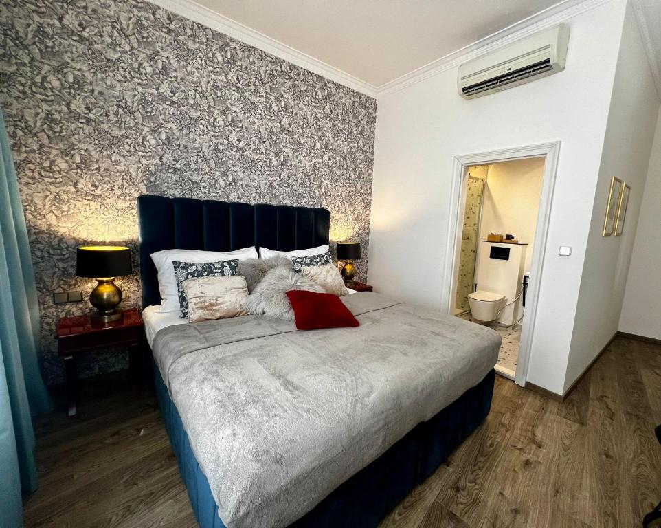 Postel nebo postele na pokoji v ubytování Antik Hotel Prague