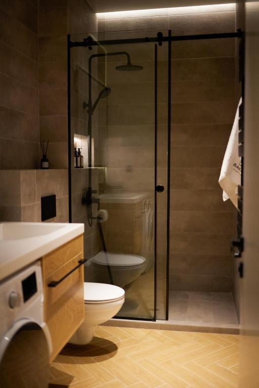Koupelna v ubytování BARBAR APART HOTEL