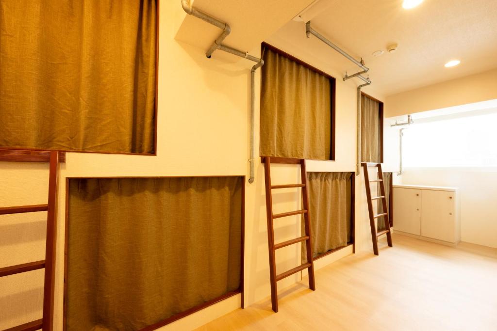 Postel nebo postele na pokoji v ubytování Cat Tail Pocket Inn