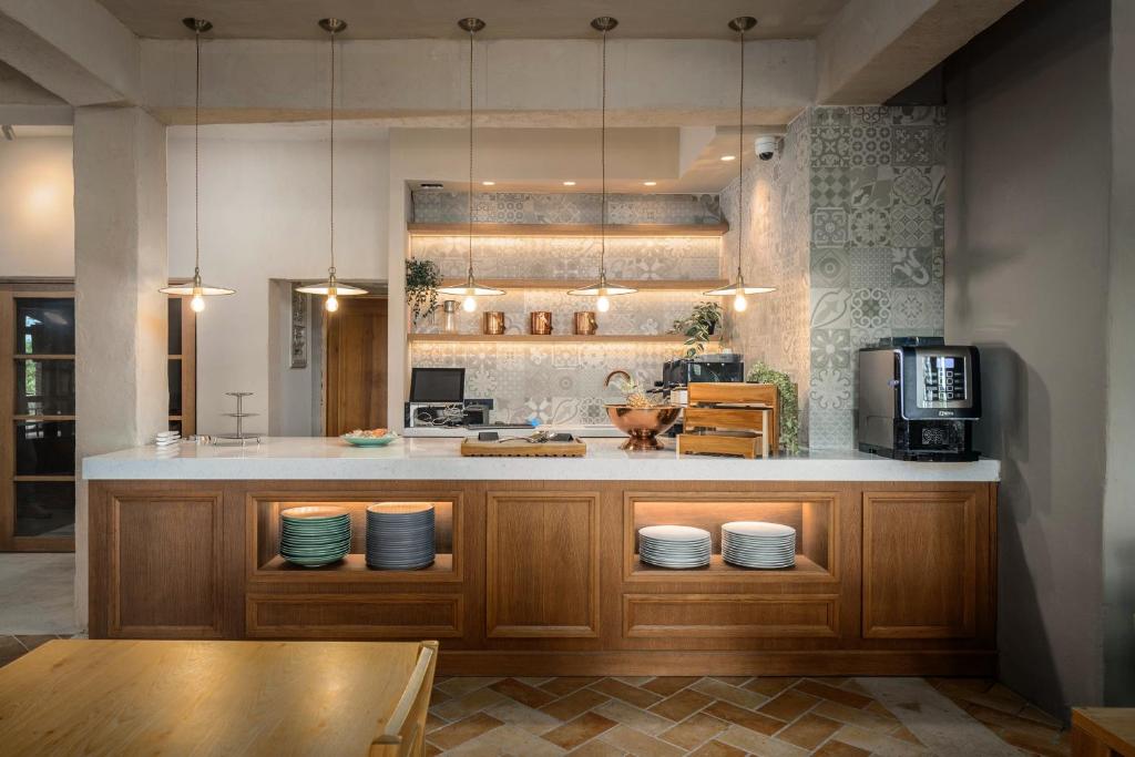 Una cocina o zona de cocina en Boutique Hotel Paradiso