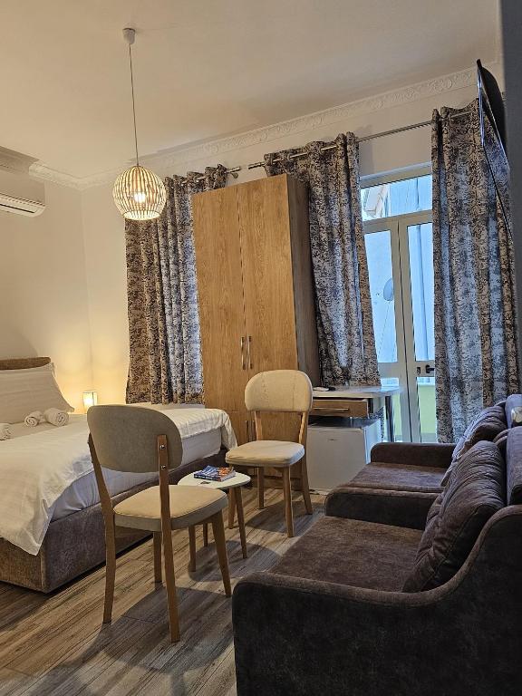 Postel nebo postele na pokoji v ubytování Vila HK