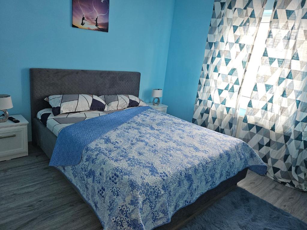 Ένα ή περισσότερα κρεβάτια σε δωμάτιο στο Vila Elena