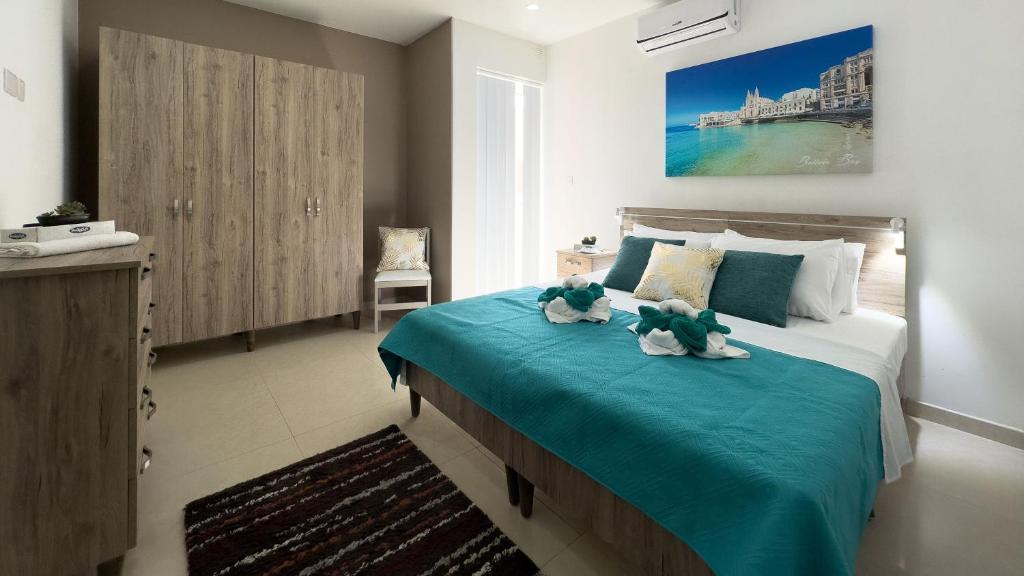 Postel nebo postele na pokoji v ubytování Apartament in Ta' Xbiex 3BR- 3 min Yatch Marina