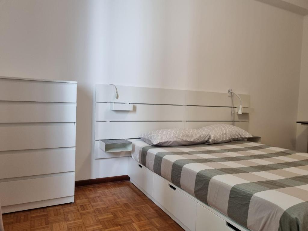 Letto o letti in una camera di Apt by Trieste University