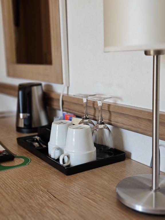 Příslušenství pro přípravu čaje a kávy v ubytování Hotel Skansen