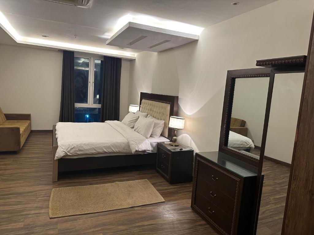 Krevet ili kreveti u jedinici u okviru objekta Gold Crest Two Bed service Apartments
