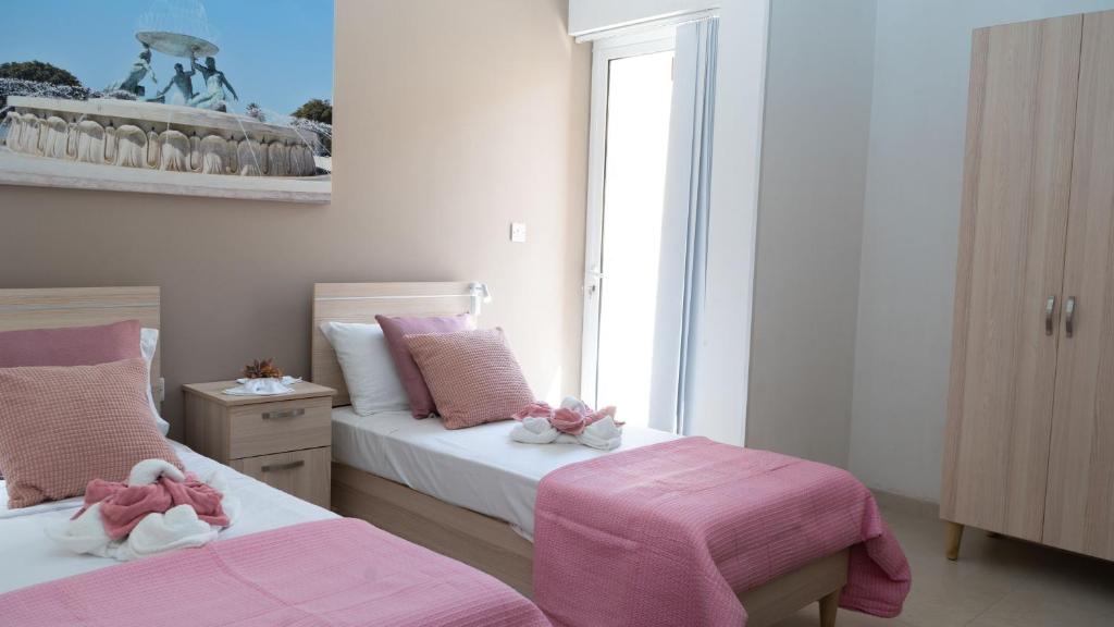 Postel nebo postele na pokoji v ubytování Apartament in Ta' Xbiex 3BR- 3 min Yatch Marina