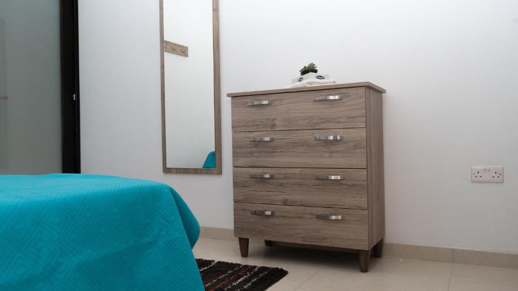 Postel nebo postele na pokoji v ubytování Apartament in Ta' Xbiex 3BR- 3 min Yatch Marina