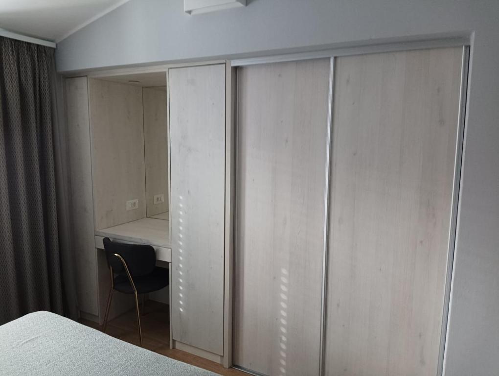 Postel nebo postele na pokoji v ubytování Neptun