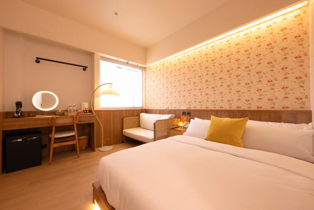 Postel nebo postele na pokoji v ubytování Cat Tail Pocket Inn