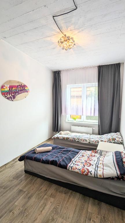 Posteľ alebo postele v izbe v ubytovaní ISLAND4U