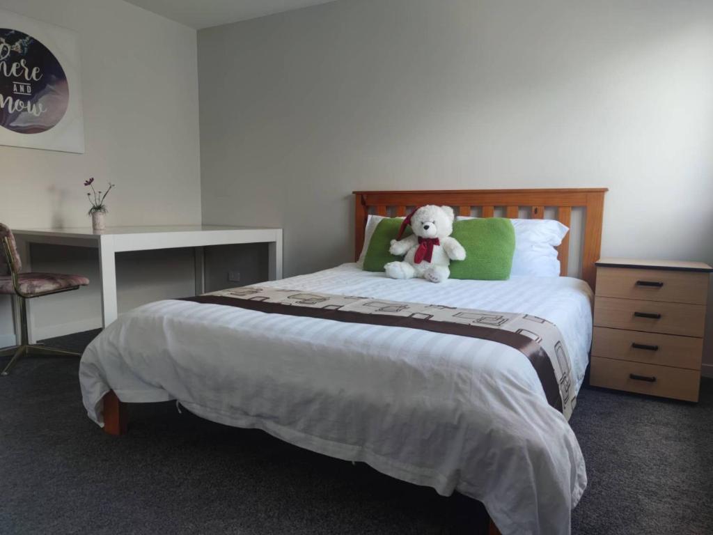 Postel nebo postele na pokoji v ubytování Auckland sweet home