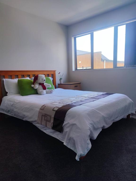 Postel nebo postele na pokoji v ubytování Auckland sweet home