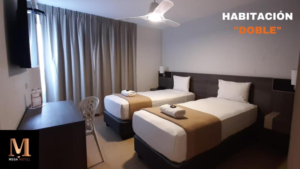 Postel nebo postele na pokoji v ubytování Hotel Mega