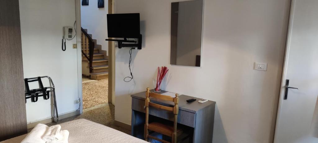 TV a/nebo společenská místnost v ubytování Villa Liberty Versilia