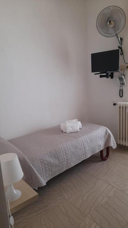 Postel nebo postele na pokoji v ubytování Villa Liberty Versilia