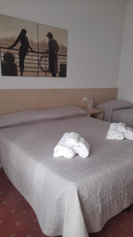 Postel nebo postele na pokoji v ubytování Villa Liberty Versilia