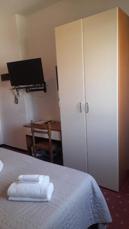 Postel nebo postele na pokoji v ubytování Villa Liberty Versilia