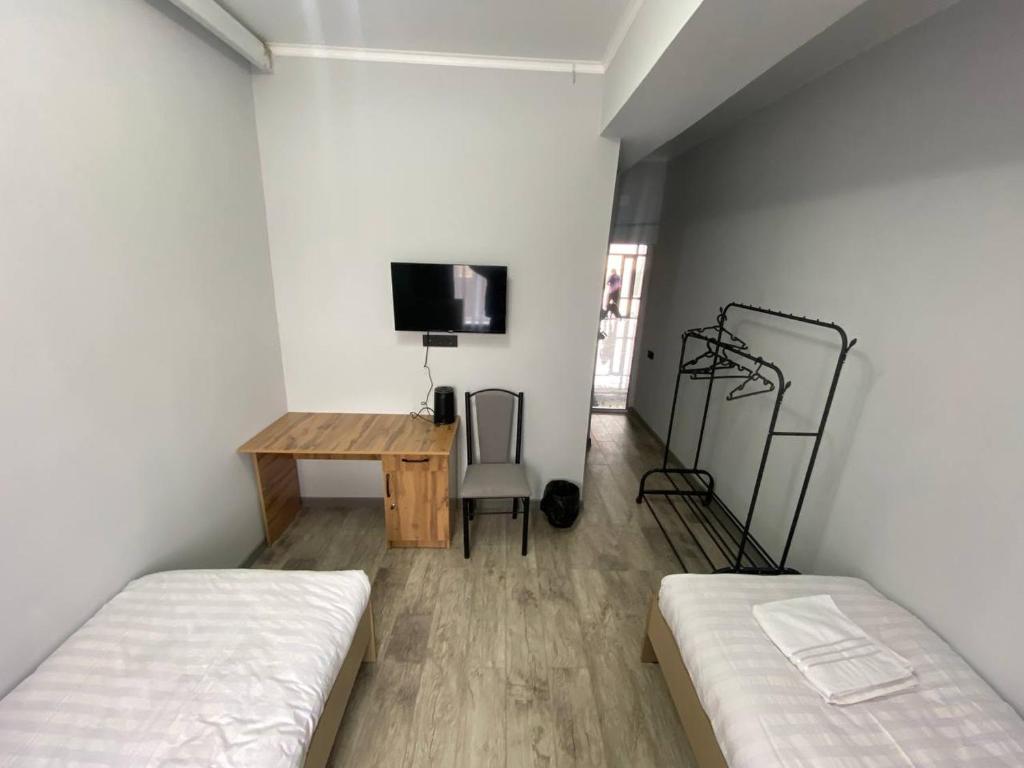 Postel nebo postele na pokoji v ubytování Bagysh Hotel